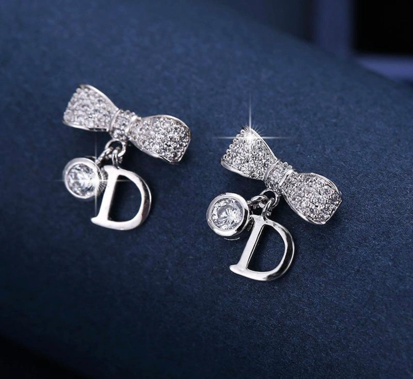 Bow D Silver Earing